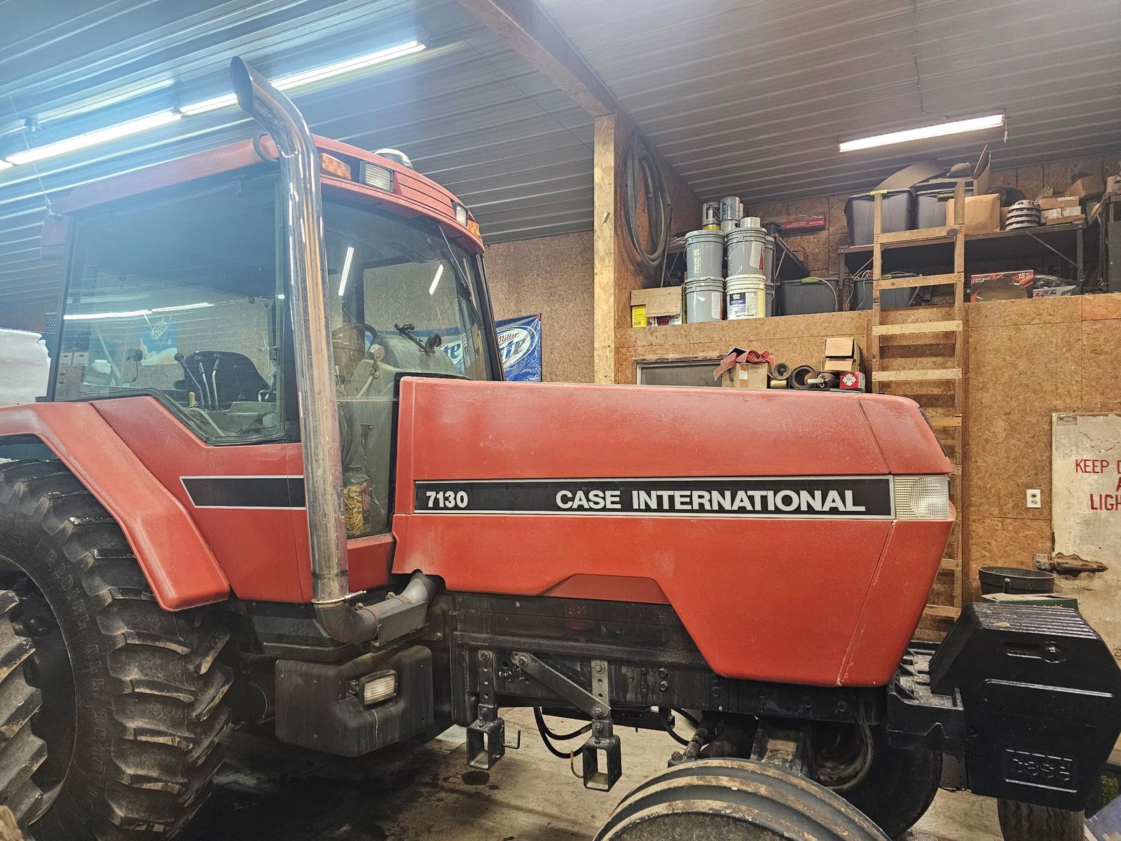 Case IH 7130 Magnum tractor before refinishing — chalky oxidized red paint